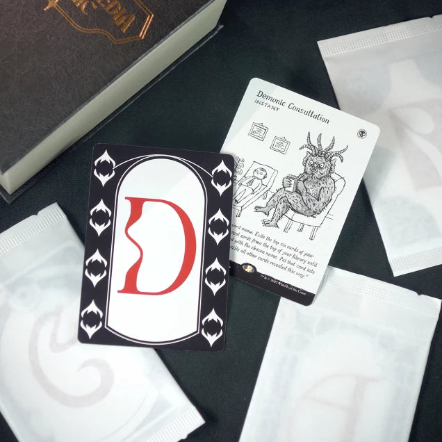 Secret Lair Countdown Kit – 26 einzeln verpackte Premium-MTG-Karten von A bis Z wie Urza’s Saga, Sol Ring und Demonic Consultation.