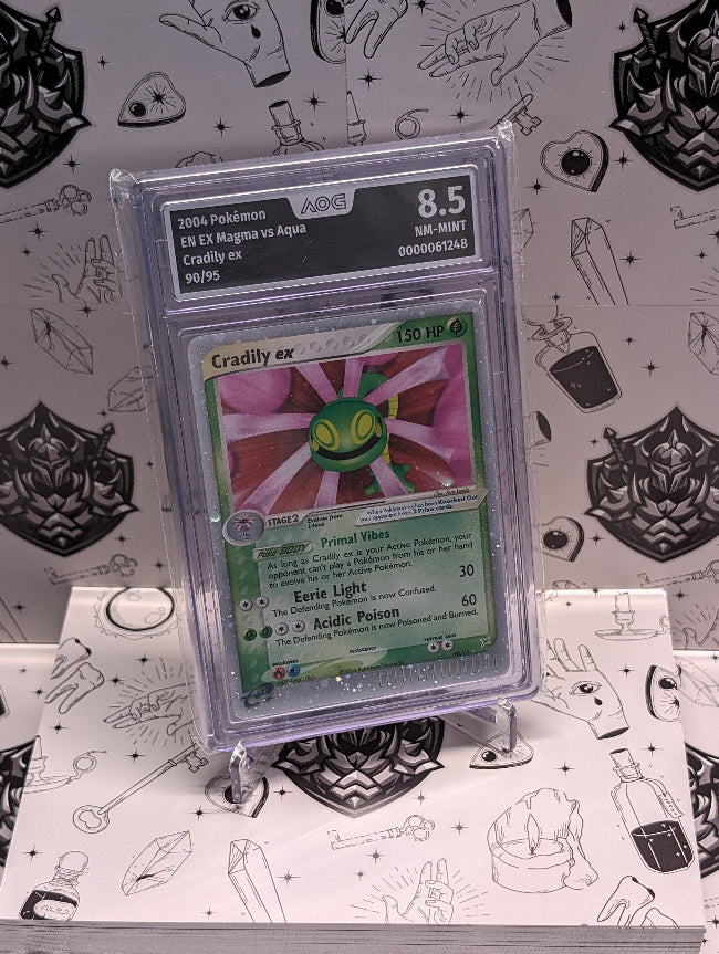 Pokémonkarte Cradily ex 90/95 aus EX Magma vs Aqua (2004), Englisch, ex Holo Rare mit AOG Grading 8.5 – seltene Sammlerkartenversion in sehr gutem Zustand.